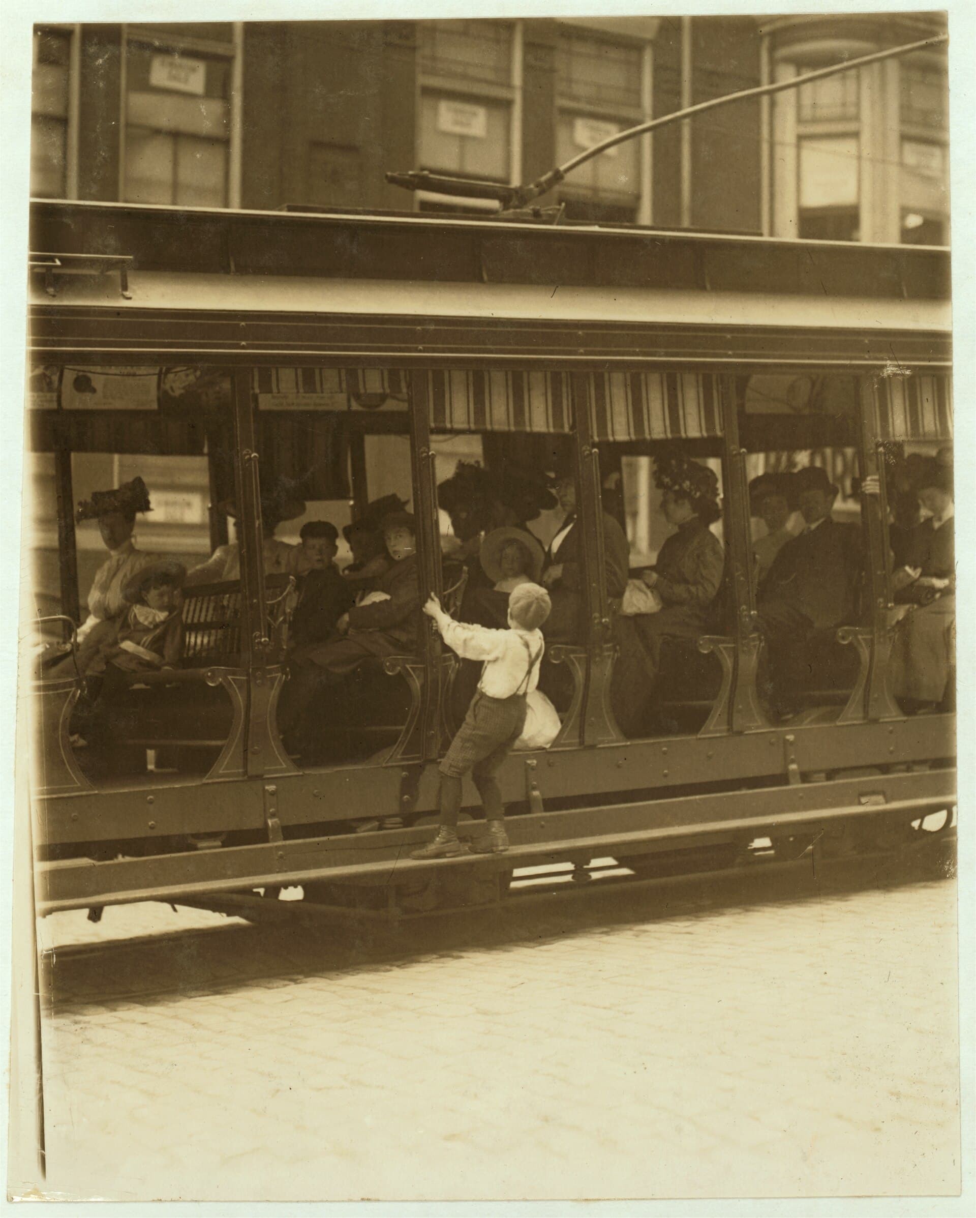 Donald Mallick, ('Happy'), 203 King Street. 9 years of age, selling newspapers 5 years. Average earnings 35 ce