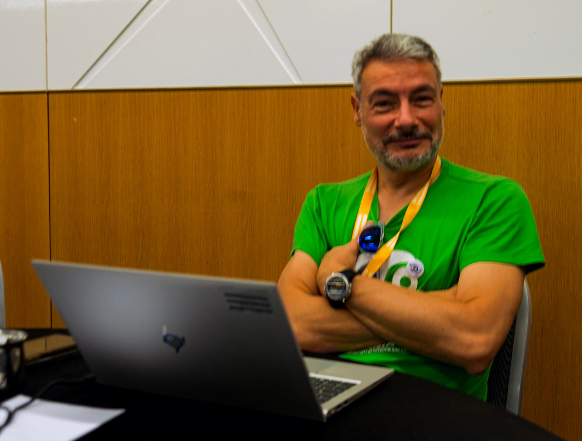 Diego Delso and laptop at Wikimania 2023