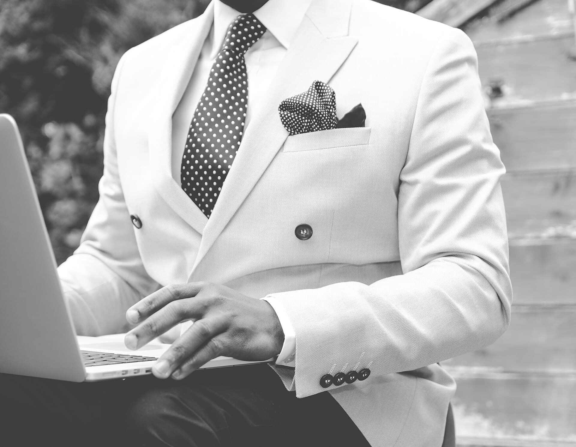 Elegant man with a laptop (Unsplash)